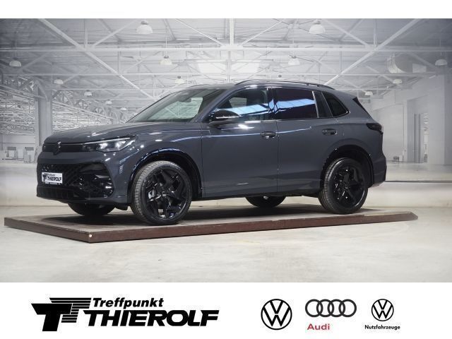 Uranograu Gebraucht 2024 VW Tiguan R-line SUV | 51.780 € - Bild 1/4