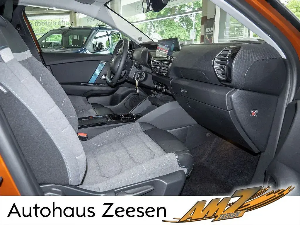 Gebraucht Citroën e-C4 Feel 100 kW (136 PS) 2022 Karamellbraun (metallic) Limousine