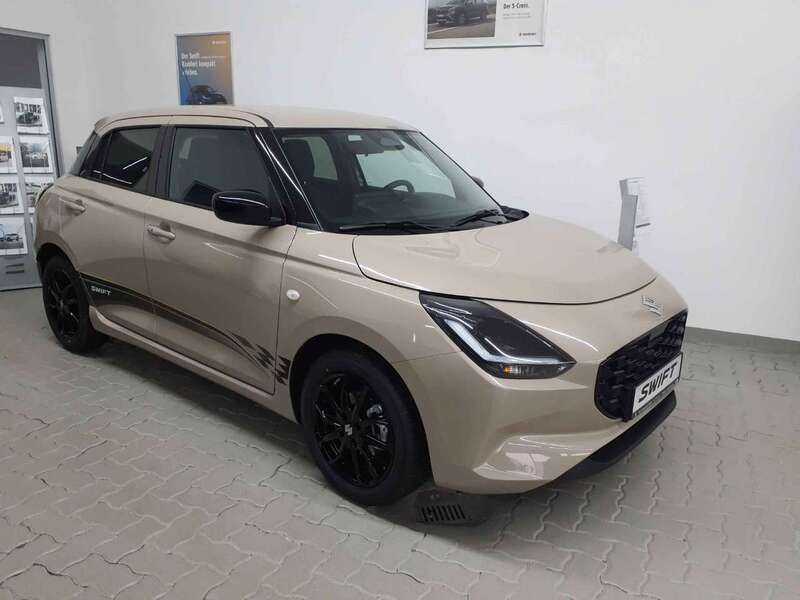 Caravan ivory metallic Neu 2024 Suzuki Swift Comfort Kleinwagen | 19.990 € - Bild 1/4