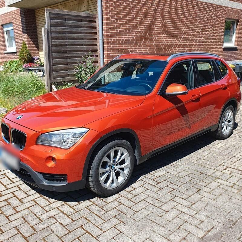 Orange Gebraucht 2013 BMW X1 Sport Line SUV | 7.250 € (Superpreis) - Bild 1/4
