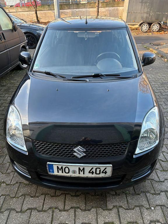 Schwarz Gebraucht 2010 Suzuki Swift Basic Limousine | 3.299 € (Fairer Preis) - Bild 1/4