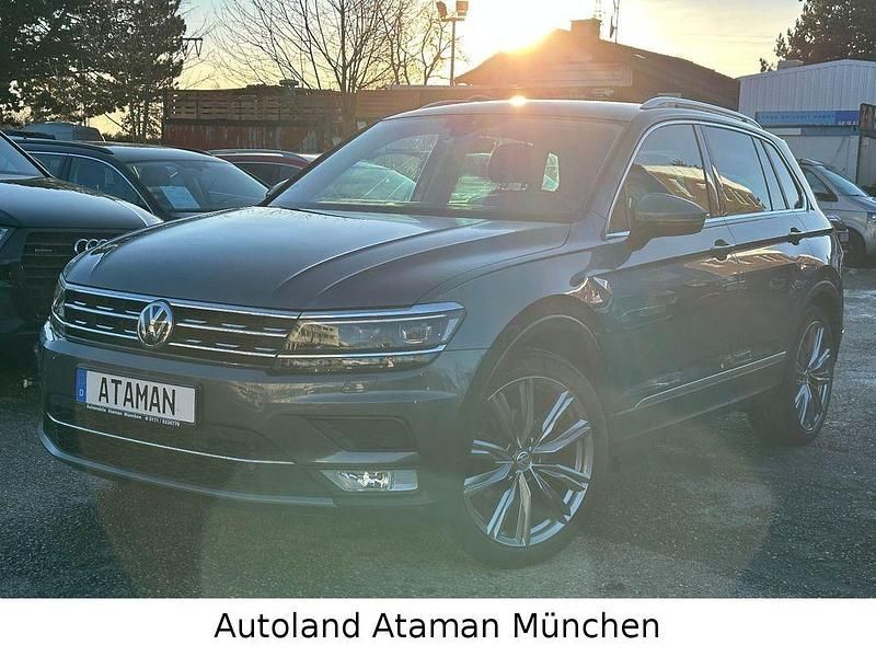 Indiumgrau Gebraucht 2016 VW Tiguan Highline SUV | 18.990 € (Fairer Preis) - Bild 1/4