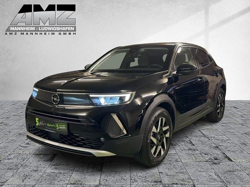 Gebraucht Opel Mokka-e Elegance 100 kW (136 PS) 2022 Diamant schwarz/karbon schwarz SUV