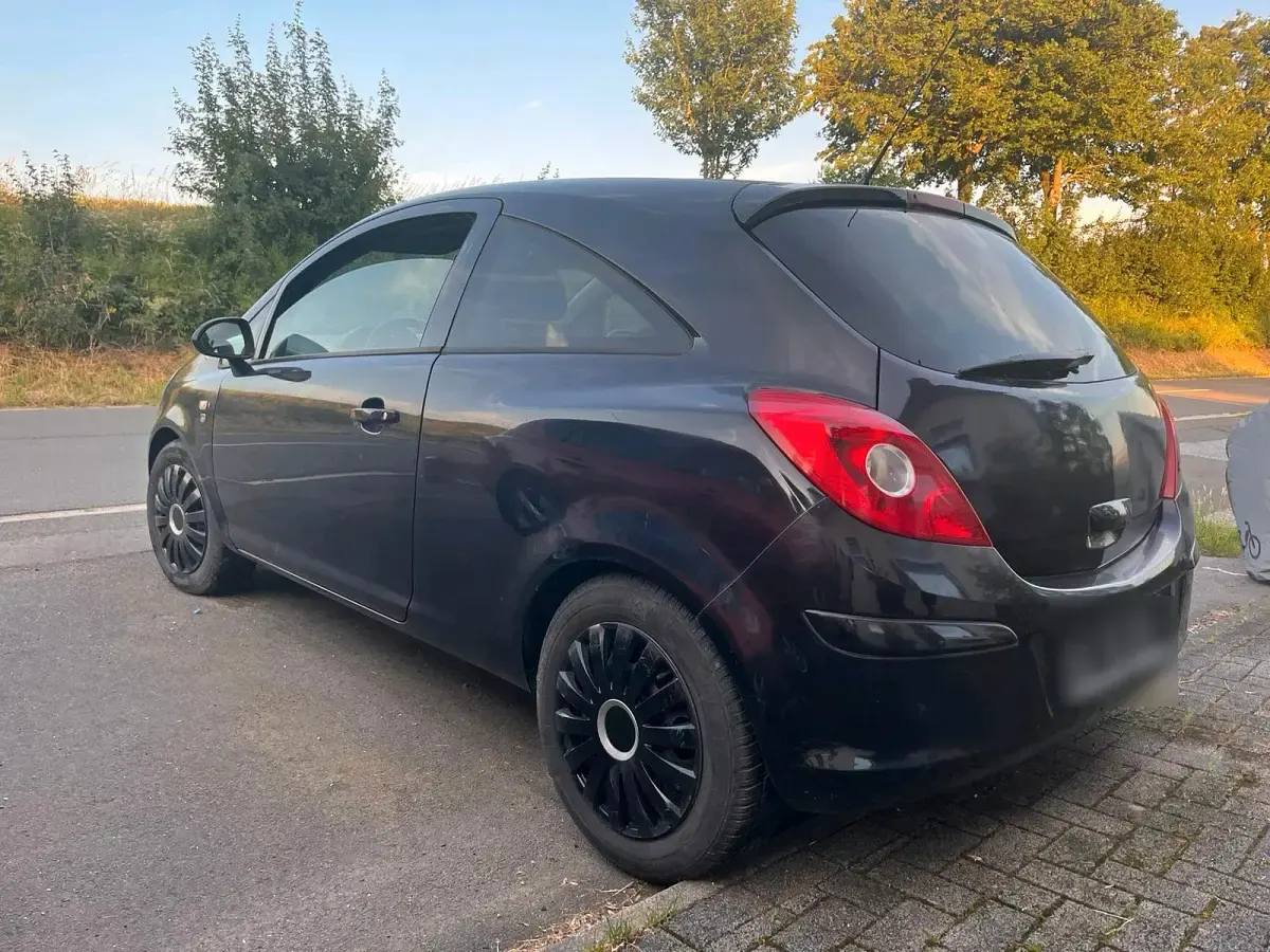Gebraucht Opel Corsa 69 PS (50 kW) 2011 Schwarz Kleinwagen