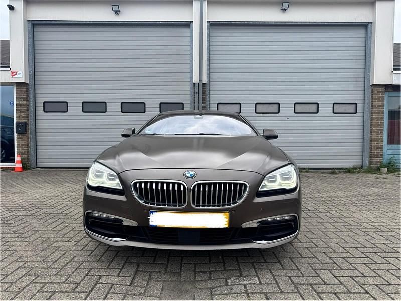 Braun Gebraucht 2015 BMW 650 Coupé | 27.950 € - Bild 1/4