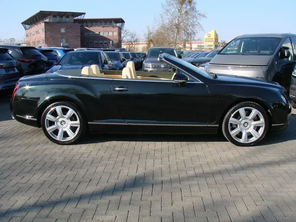 Gebraucht Bentley Continental GT Convertible 560 PS (411 kW) 2009 Midnight emerald pearl (metallic) Cabrio