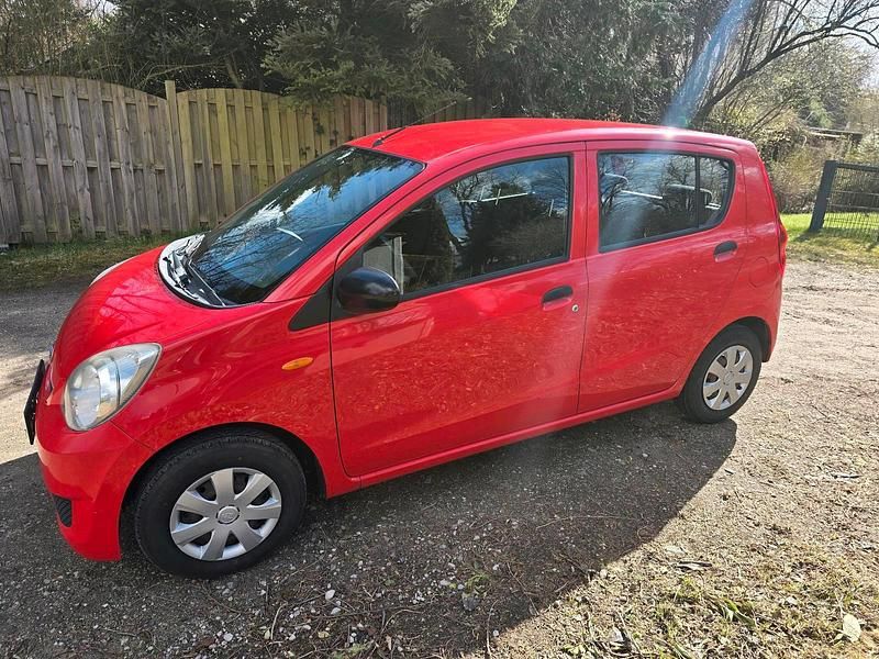 Gebraucht Daihatsu Cuore 69 PS (50 kW) 2011 Rot Kleinwagen