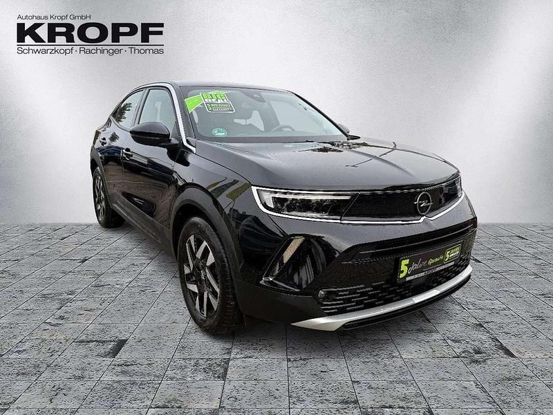 Gebraucht Opel Mokka-e Elegance 100 kW (136 PS) 2022 Diamant schwarz/karbon schwarz SUV