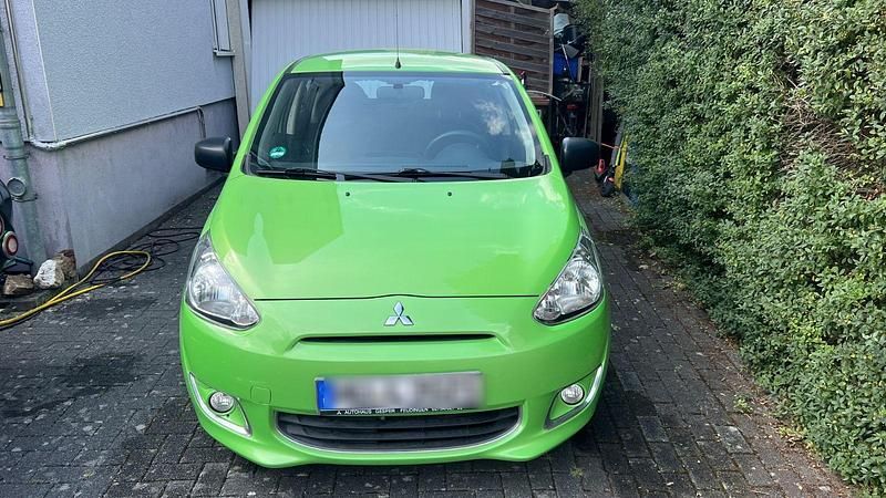 Grün Gebraucht 2013 Mitsubishi Space Star Kleinwagen | 2.800 € (Guter Preis) - Bild 1/4