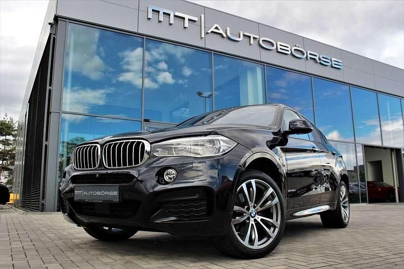 Carbonschwarz metallic Gebraucht 2018 BMW X6 M Sport SUV | 44.900 € (Teuer) - Bild 1/4