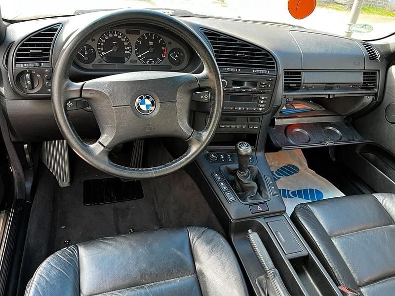 Gebraucht BMW 318 Cabriolet 115 PS (84 kW) 1998 Schwarz Cabrio