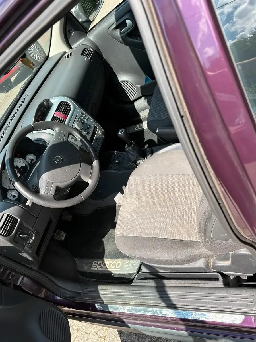 Usata Opel Corsa 80 CV (58 kW) 2006 Viola Utilitaria