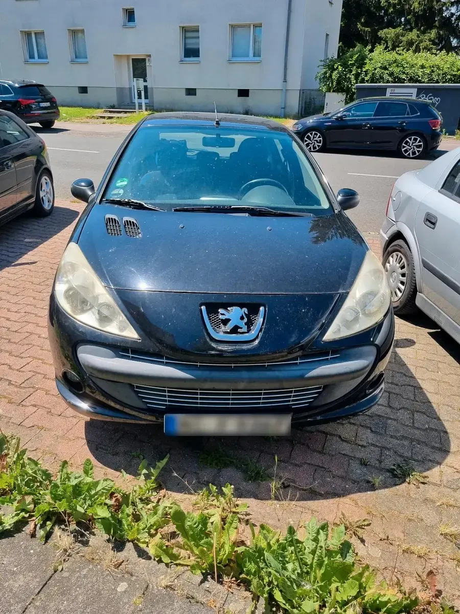 Gebraucht Peugeot 206 72 PS (52 kW) 2012 Schwarz Limousine