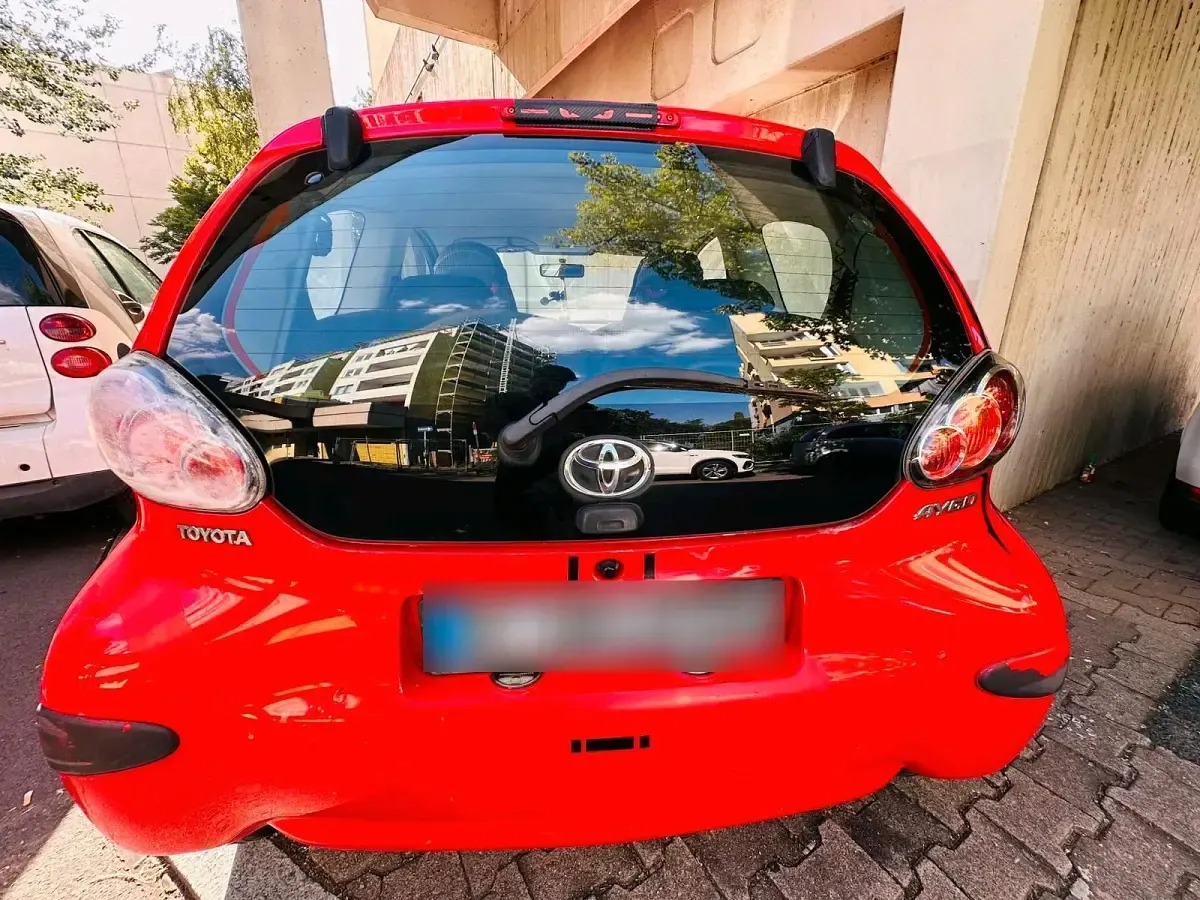 Gebraucht Toyota Aygo 68 PS (50 kW) 2009 Rot Kleinwagen
