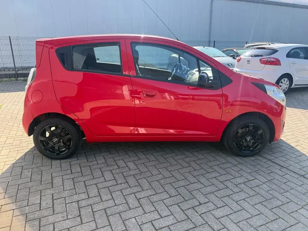 Gebraucht Chevrolet Spark LS 110 PS (80 kW) 2011 Rot Kleinwagen