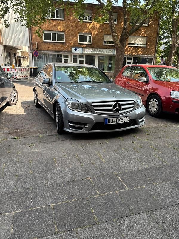 Grau Gebraucht 2012 Mercedes C200 Limousine | 9.999 € (Fairer Preis) - Bild 1/4