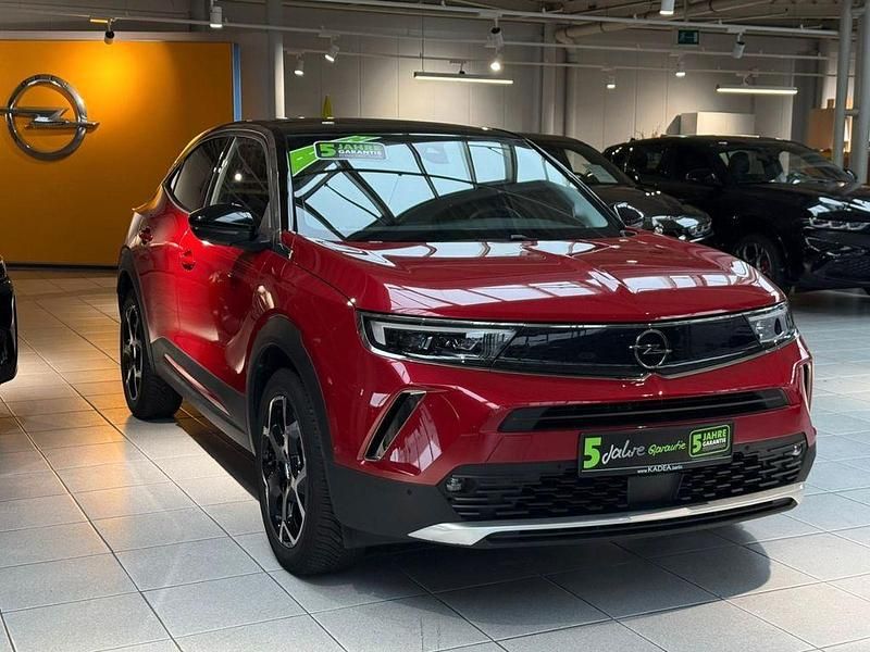 Gebraucht Opel Mokka-e 100 kW (136 PS) 2022 Power rot/kosmos rot SUV