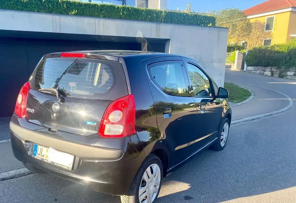 Gebraucht Nissan Pixo Acenta 68 PS (50 kW) 2011 Schwarz Kleinwagen
