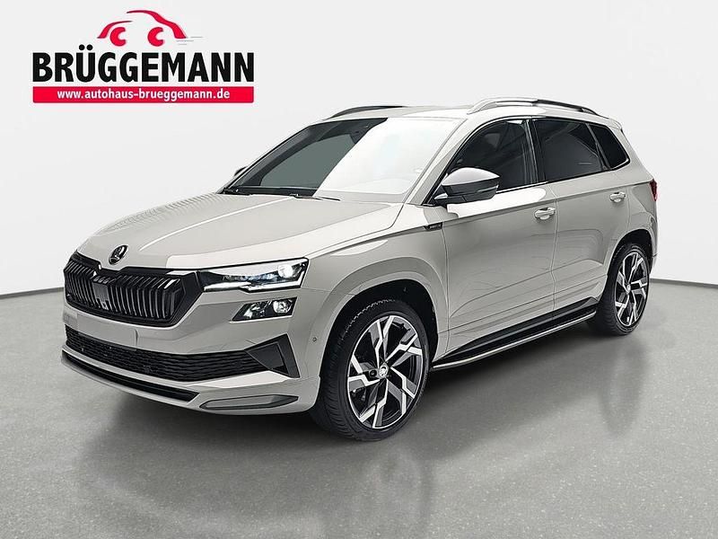 Stahlgrau Gebraucht 2024 Skoda Karoq SportLine SUV | 36.950 € (Guter Preis) - Bild 1/4