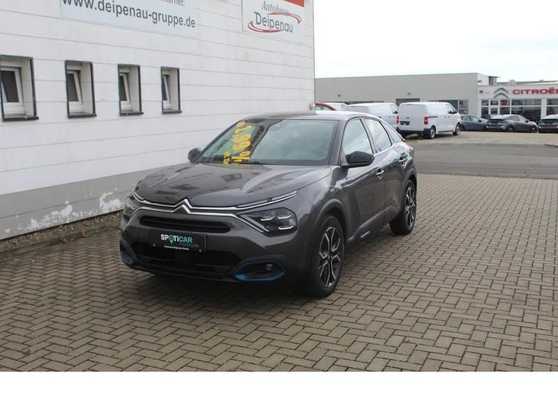 Gebraucht Citroën e-C4 Shine 100 kW (136 PS) 2023 Platinum grau Limousine