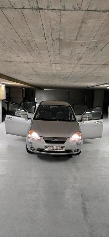 Grau Gebraucht 2002 Suzuki Liana Kombi | 400 € - Bild 1/4
