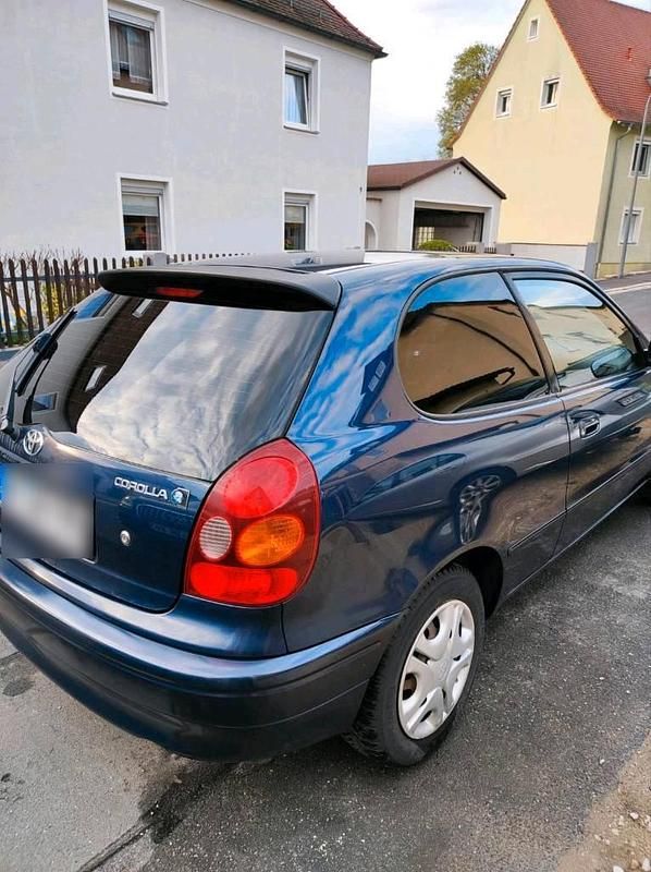 Occasion Toyota Corolla 97 ch (71 kW) 1999 Bleue Coupé