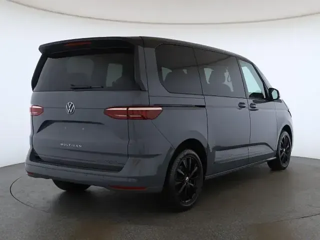 Gebraucht VW Multivan Life 204 PS (150 kW) 2025 Pure grey deep black perleffekt (metallic) Van / Kleinbus