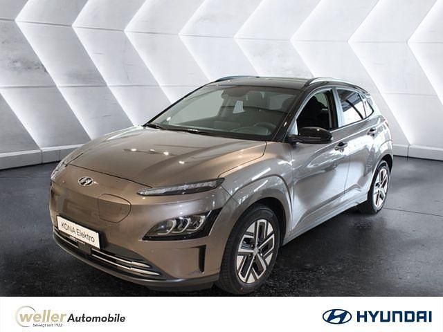 Silky bronzegraumetallic Gebraucht 2022 Hyundai Kona Prime SUV | 26.885 € (Teuer) - Bild 1/4