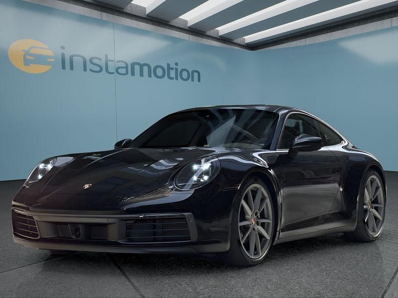 Schwarz Gebraucht 2024 Porsche 911 Carrera Coupé | 130.749 € (Etwas zu teuer) - Bild 1/4
