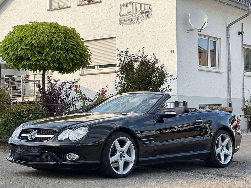 Obsidianschwarz metalliclack Gebraucht 2007 Mercedes SLR McLaren AMG Cabrio | 14.990 € - Bild 1/4