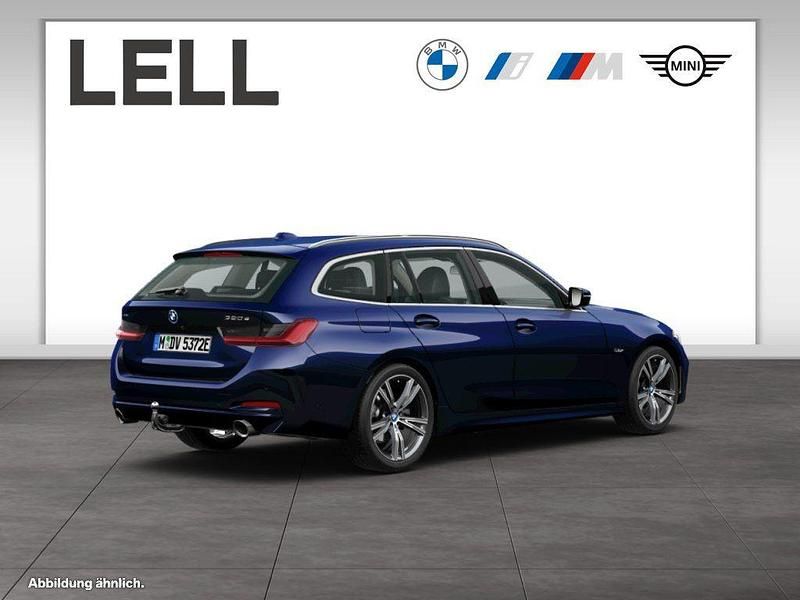Gebraucht BMW 320e Sport Line 163 PS (119 kW) 2022 Blau Kombi