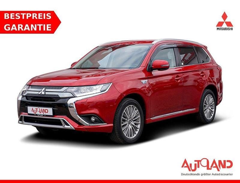 Dynamik rot (metallic) Gebraucht 2020 Mitsubishi Outlander P-HEV SUV | 22.990 € (Fairer Preis) - Bild 1/4