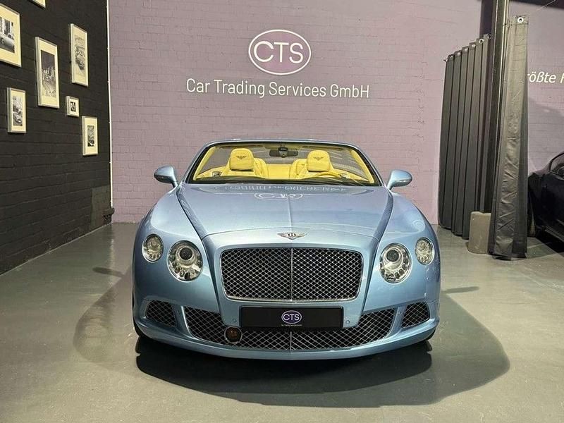 Silverlake metallic / roof blu Gebraucht 2012 Bentley Continental GT Convertible Cabrio | 74.900 € - Bild 1/4