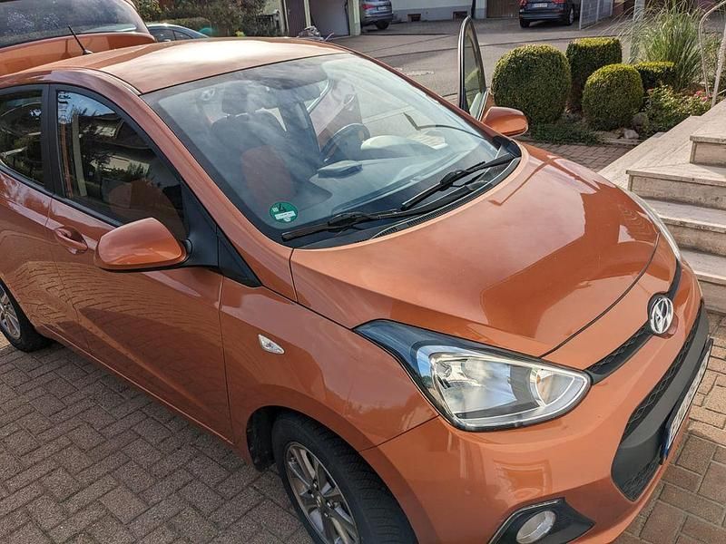Gebraucht Hyundai i10 Edition 87 PS (63 kW) 2014 Orange Kleinwagen