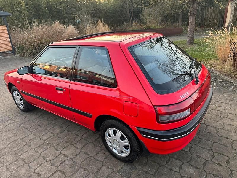 Gebraucht Mazda 323 84 PS (61 kW) 1991 Rot Limousine