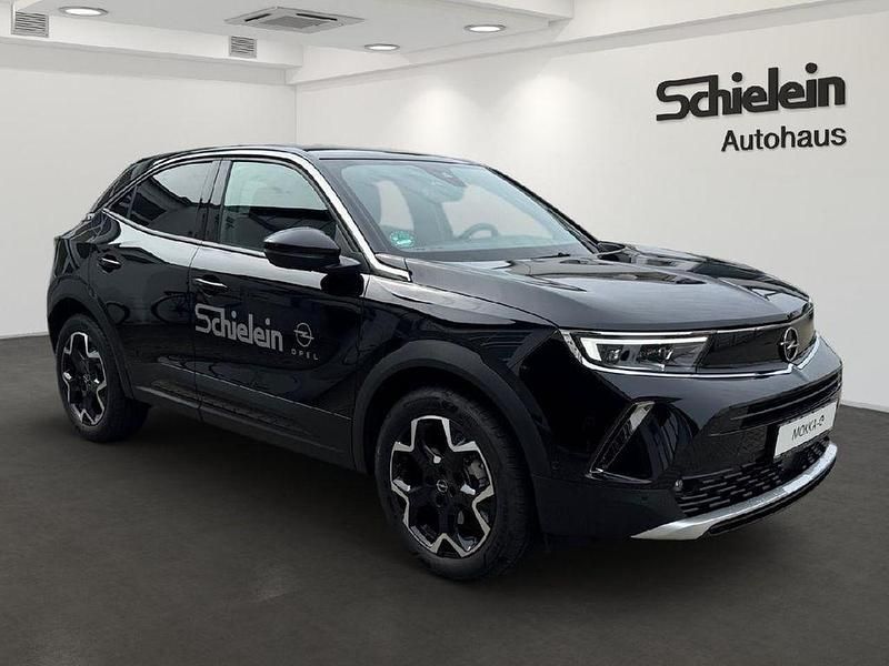 Gebraucht Opel Mokka-e Ultimate 100 kW (136 PS) 2023 Diamant schwarz/karbon schwarz SUV