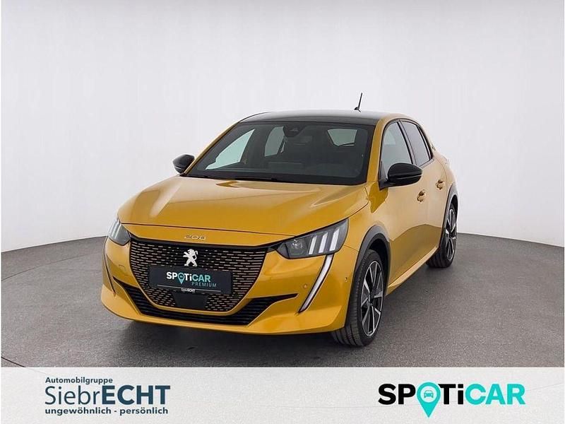 Gelb (metallic) Gebraucht 2022 Peugeot e-208 GT Kleinwagen | 18.470 € (Fairer Preis) - Bild 1/4