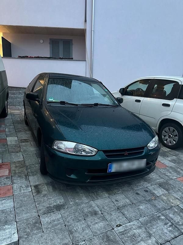 Grün Gebraucht 2000 Mitsubishi Colt Coupé | 2.999 € - Bild 1/4