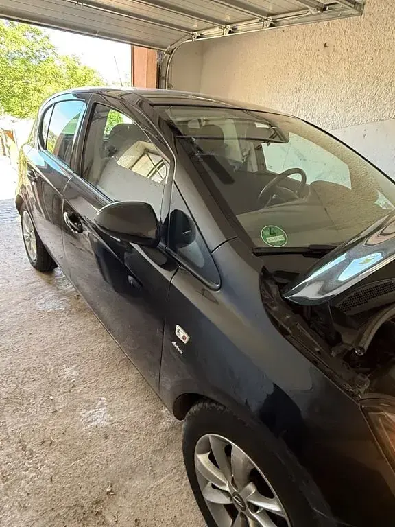 Gebraucht Opel Corsa drive 101 PS (74 kW) 2016 Schwarz Kleinwagen