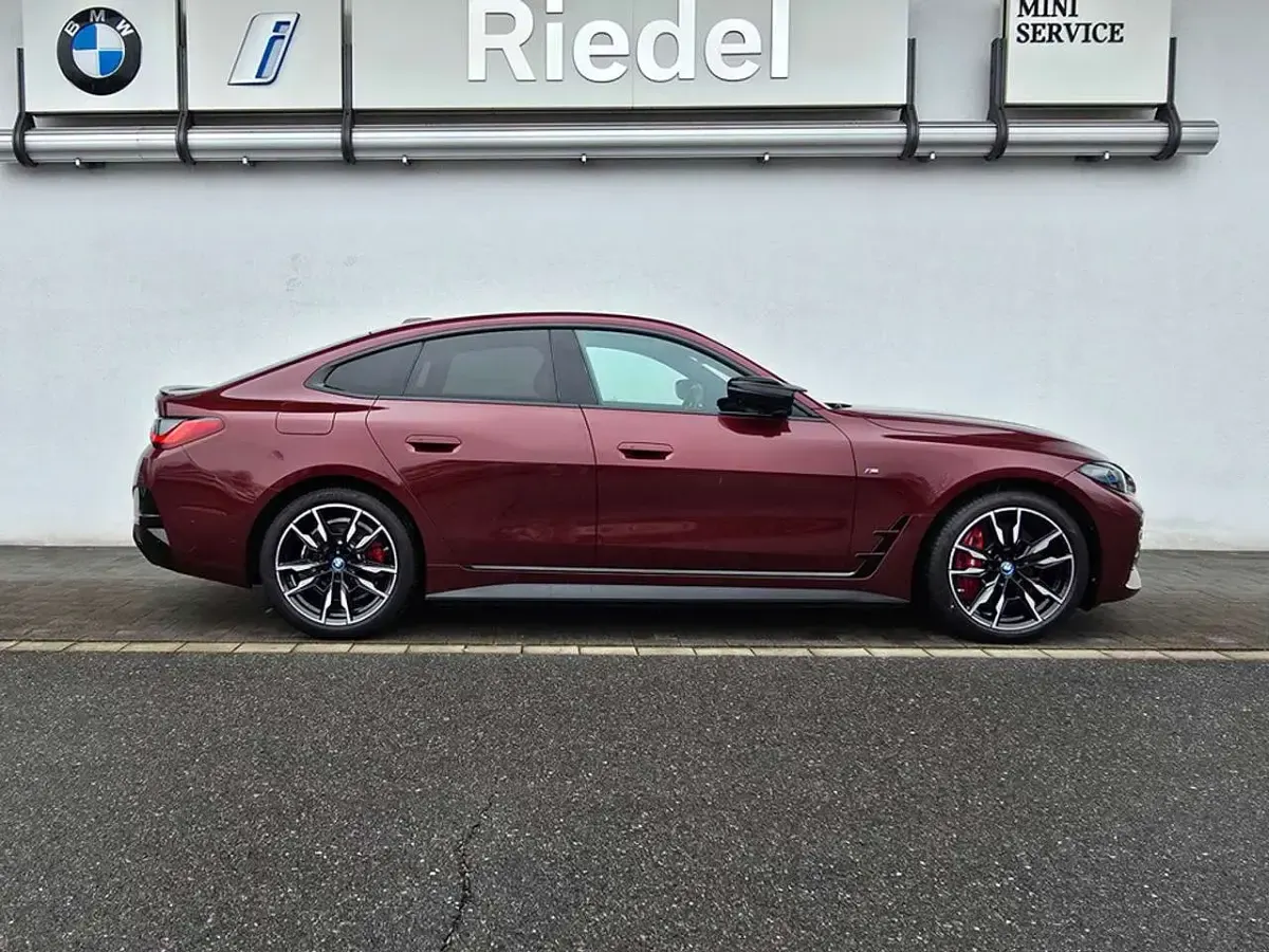 Gebraucht BMW i4 400 kW (544 PS) 2023 Aventurinrot metallic Limousine