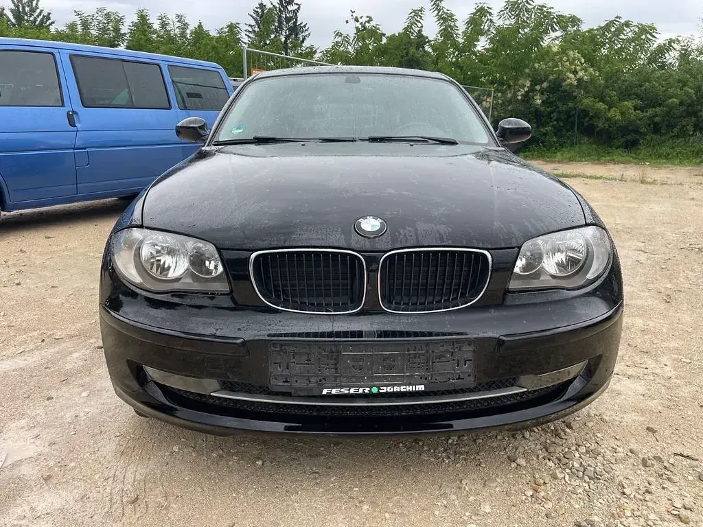 Używany BMW 116 122 KM (89 kW) 2009 Czarny Hatchback