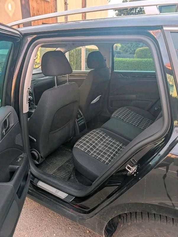 Second-hand Skoda Superb 170 CP (125 kW) 2012 Negru Break