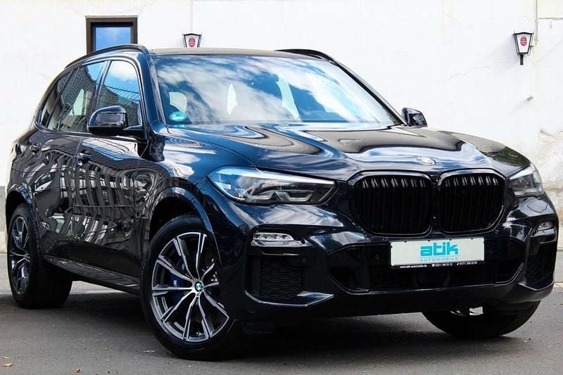 Carbonschwarz Gebraucht 2020 BMW X5 M Sport SUV | 44.888 € (Guter Preis) - Bild 1/4