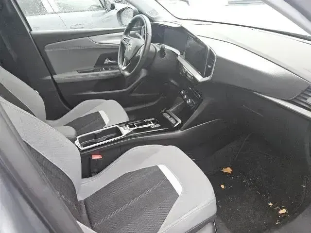 Gebraucht Opel Mokka-e Elegance 100 kW (136 PS) 2023 Grau metallic SUV
