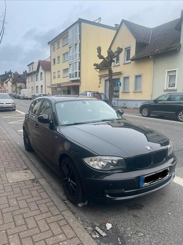 Gebraucht BMW 116 122 PS (89 kW) 2009 Schwarz Kleinwagen