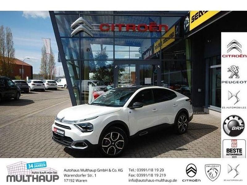 Weiss Gebraucht 2023 Citroën e-C4 Shine Limousine | 26.240 € (Teuer) - Bild 1/4