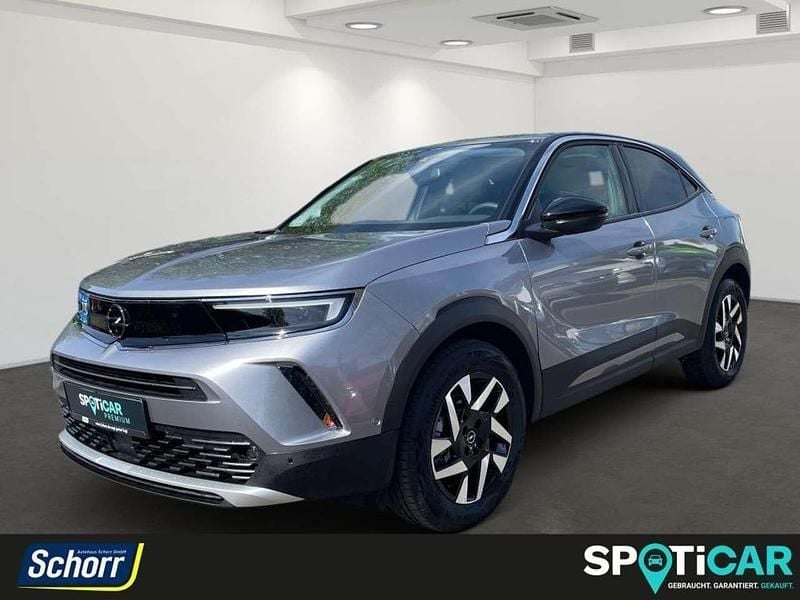 Kontrast grau (metallic) Gebraucht 2023 Opel Mokka-e Elegance SUV | 20.885 € (Guter Preis) - Bild 1/4