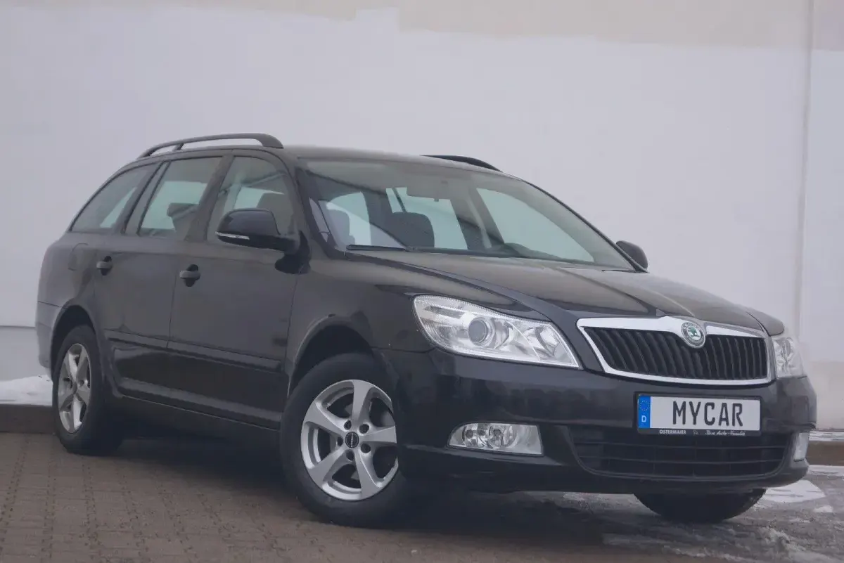 Używany Skoda Octavia 80 KM (58 kW) 2010 Czarny Kombi