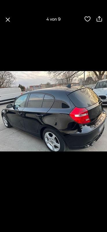 Second-hand BMW 116 122 CP (89 kW) 2009 Negru Hatchback