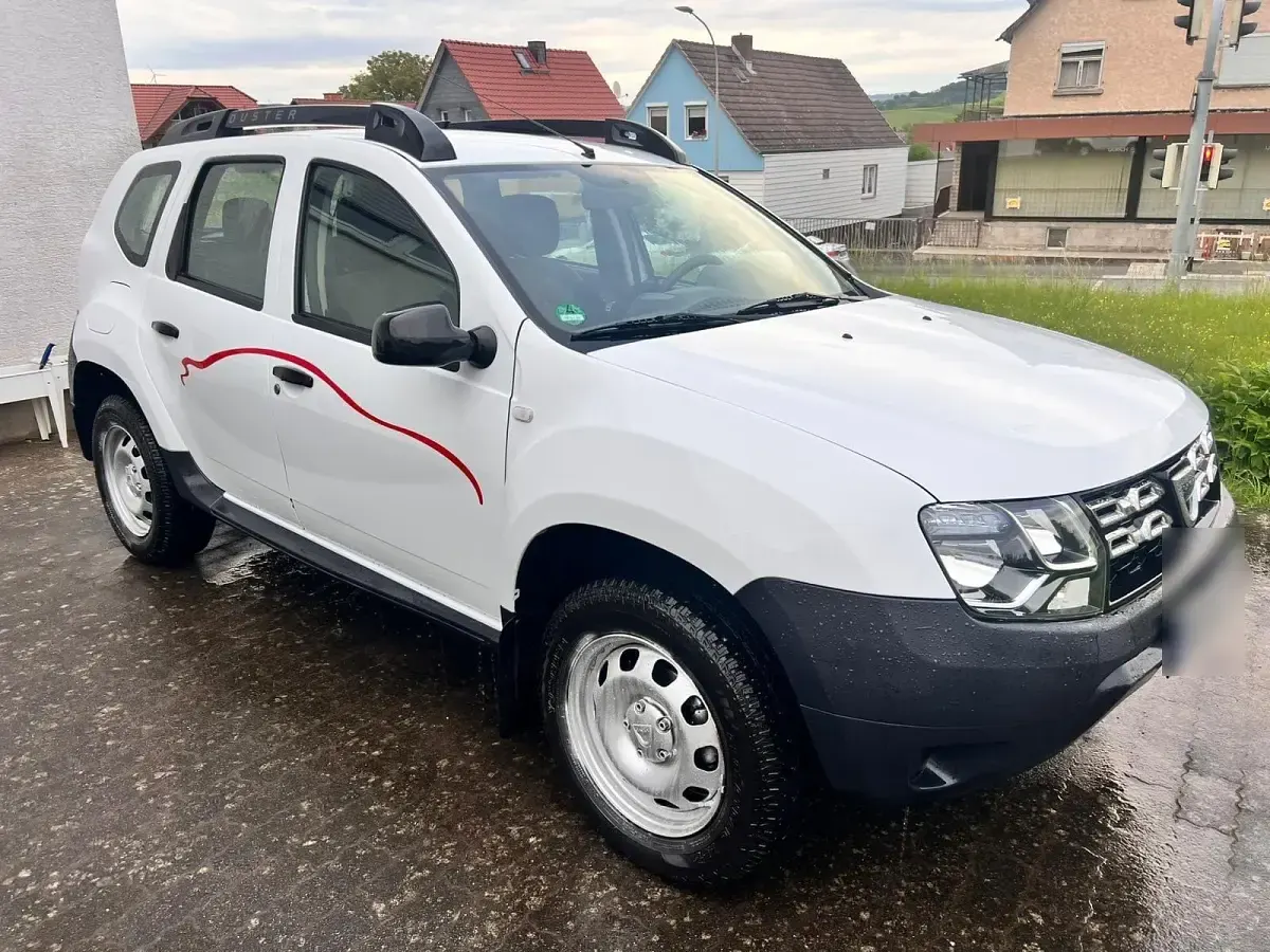 Używany Dacia Duster 102 KM (75 kW) 2014 Biały SUV